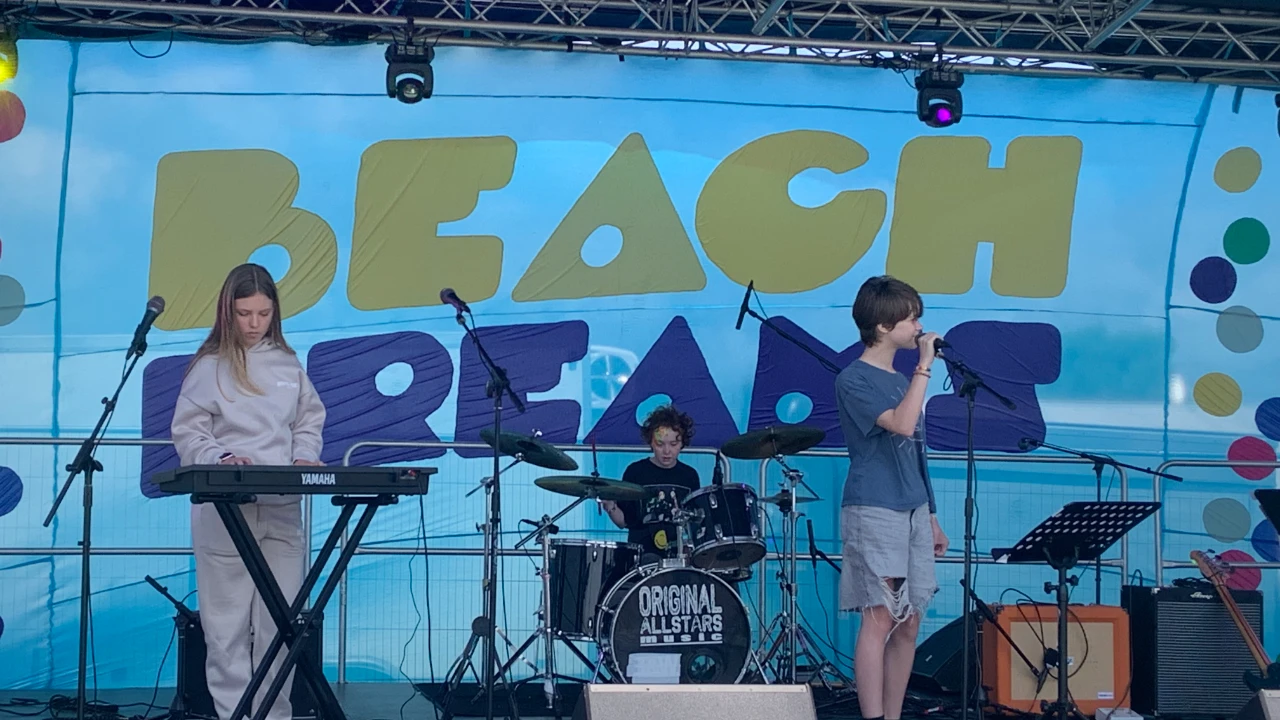 Beach Dream stage setup at Adur Festival waterfront venue with coastal views